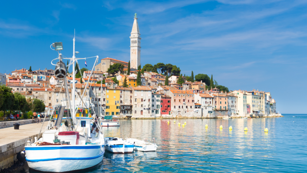 Rovinj, Istria Croatia - a boat in the water near the city of Rovinj