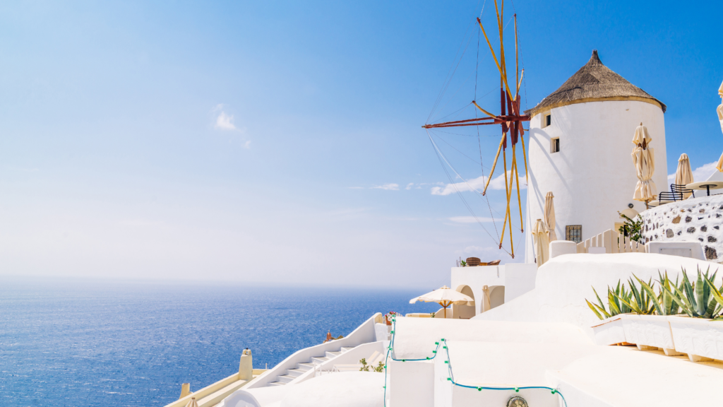 Greek countryside with white buildings and windmill are always a part of the scenery when you choose to explore Greek culinary experiences